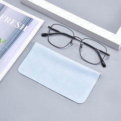 Cloth being used to clean camera lens and phone screen