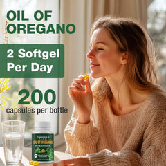 Oregano oil and black seed oil softgels spilled on a white surface
