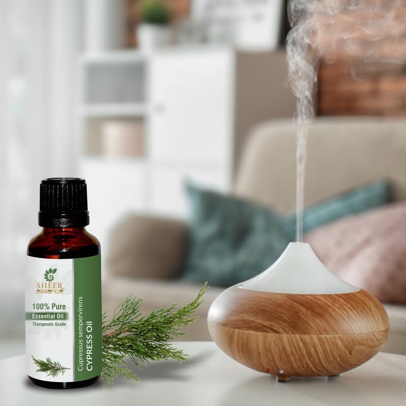 Sheer Essence Cypress Oil with bath drops suggests a relaxing bath ritual.