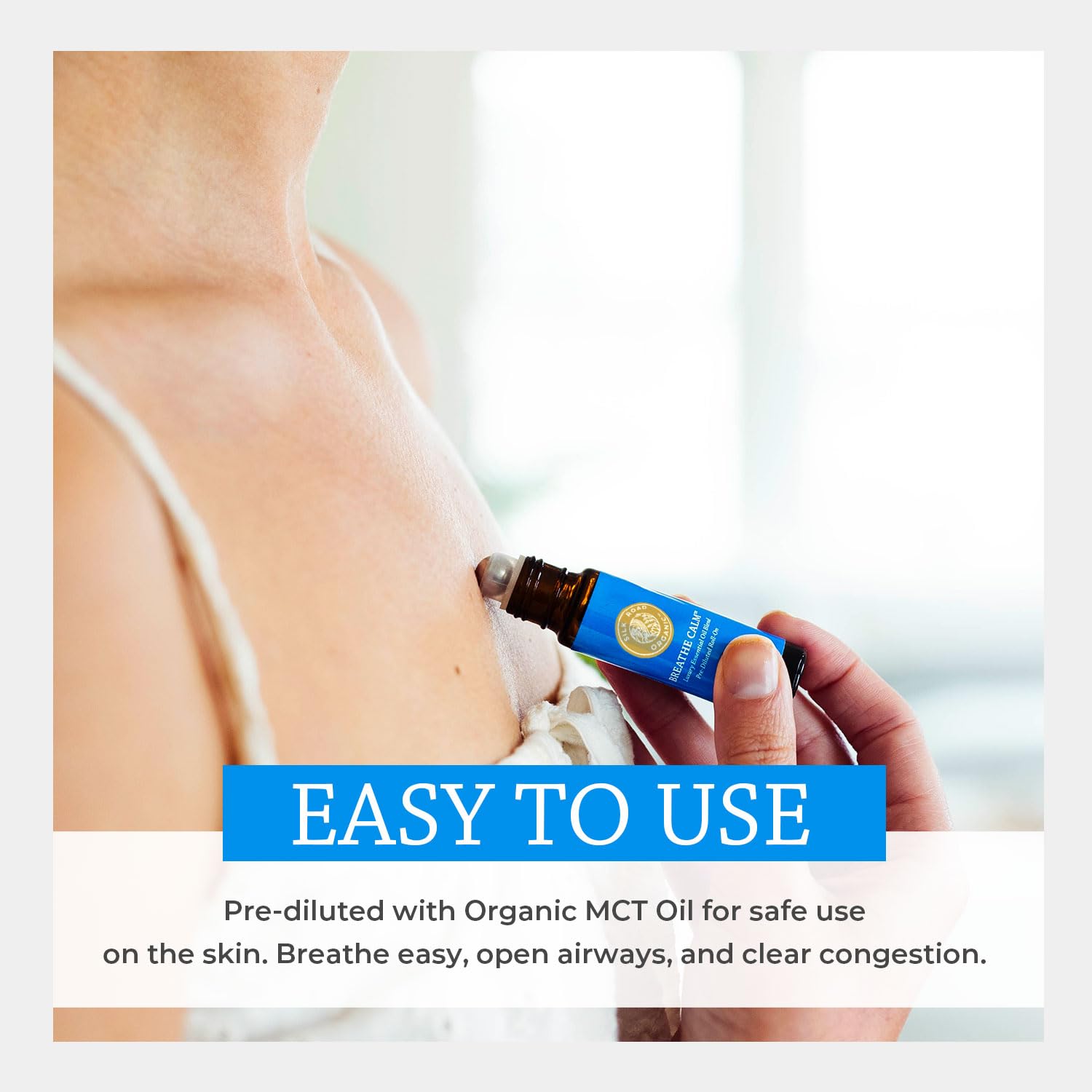 Box packaging and bottle of Silk Road Breathe Calm essential oil roll-on