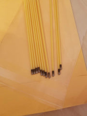 Silver Nitrate caustic sticks close-up highlighting polished surface for controlled measurements.