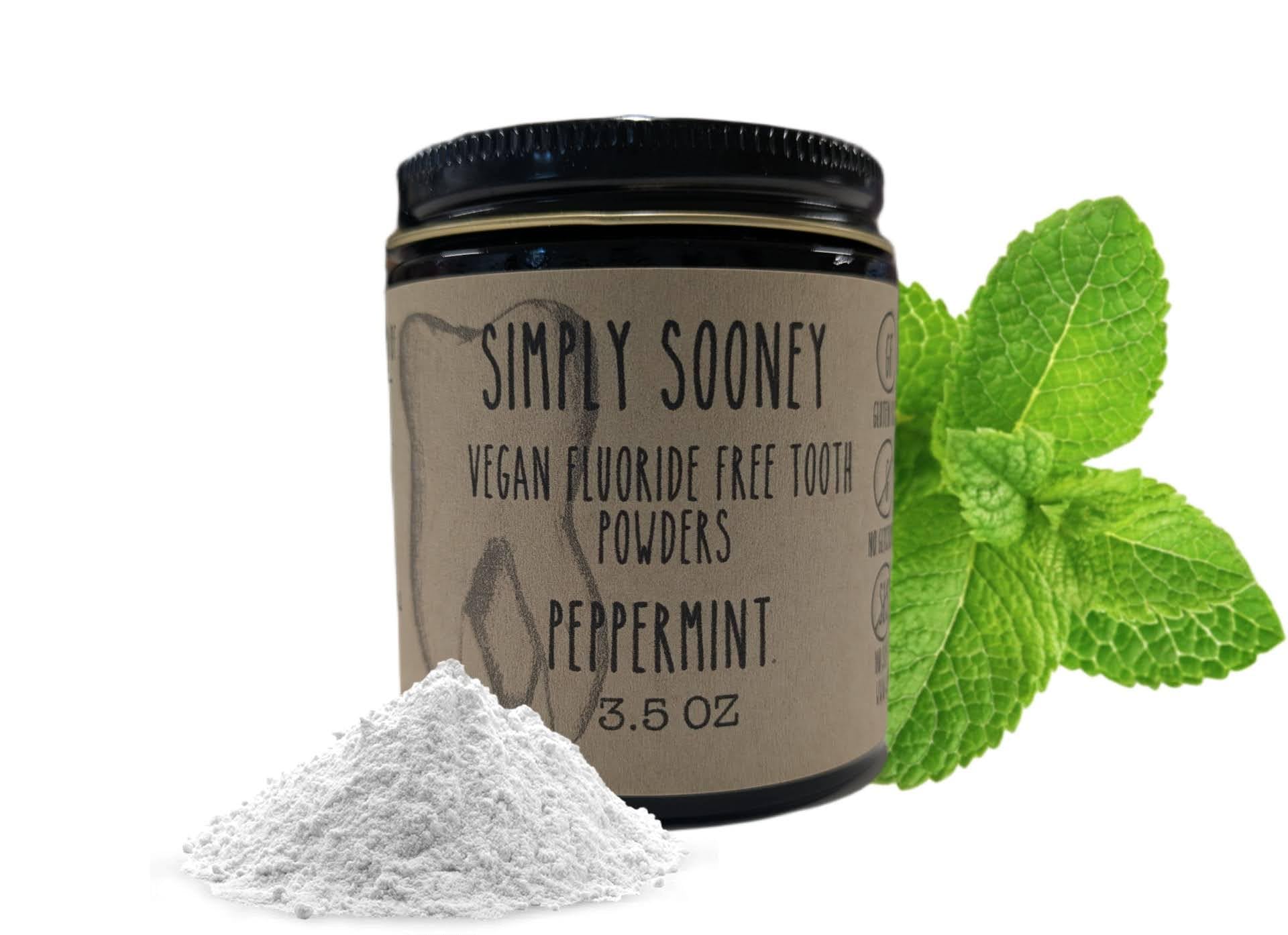 Front view of Simply Sooney remineralizing vegan fluoride-free tooth powder in a glass jar