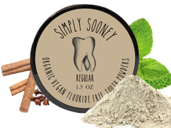 Front view of Simply Sooney Vegan Mineral Tooth Powder Cinnamon & Clove flavor in a 1.5oz BPA-free jar