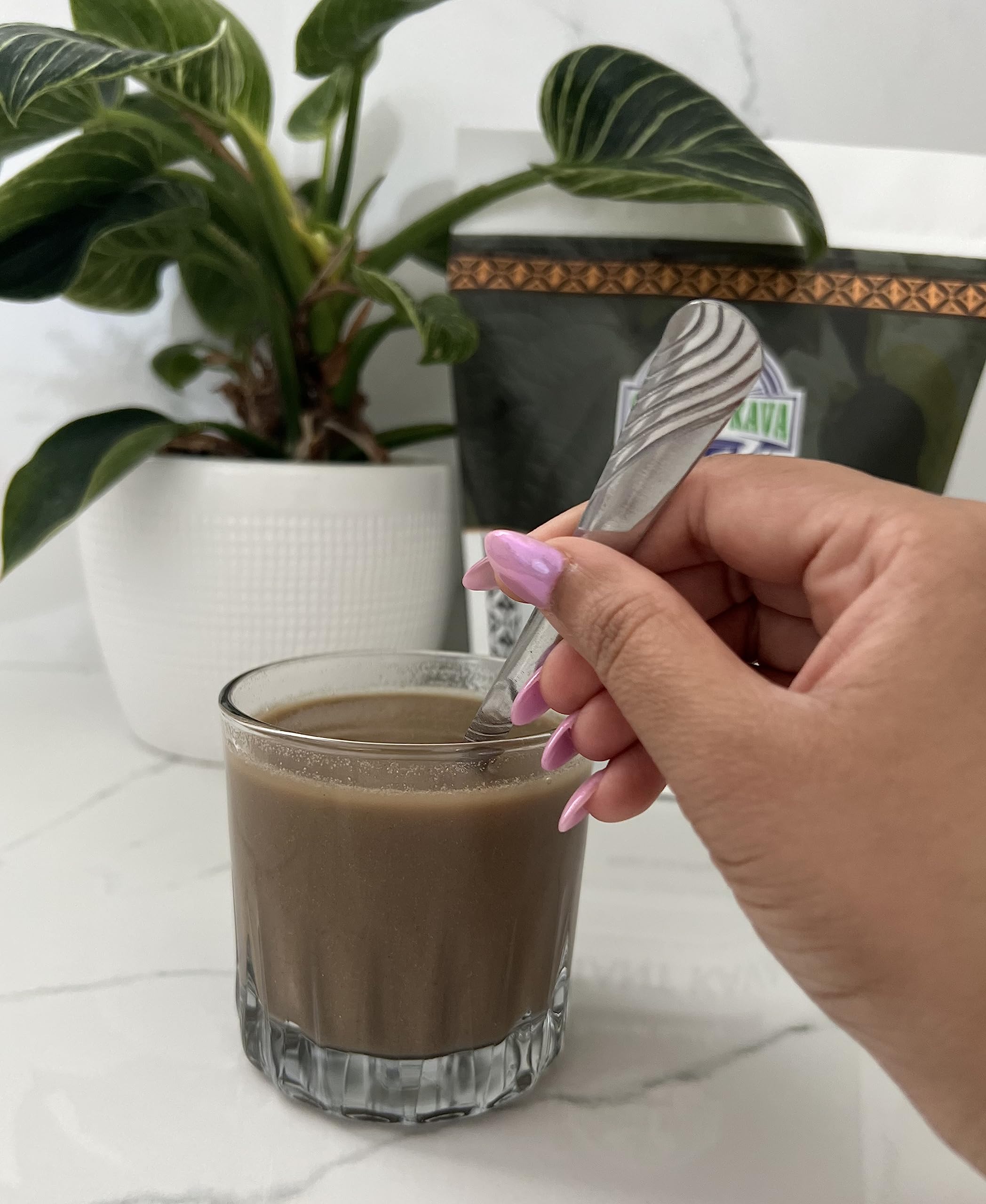 Kava powder dissolving in a beverage