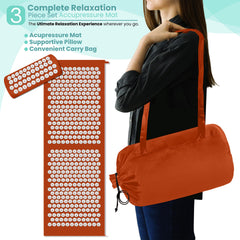 Person using the mat for back and neck relief