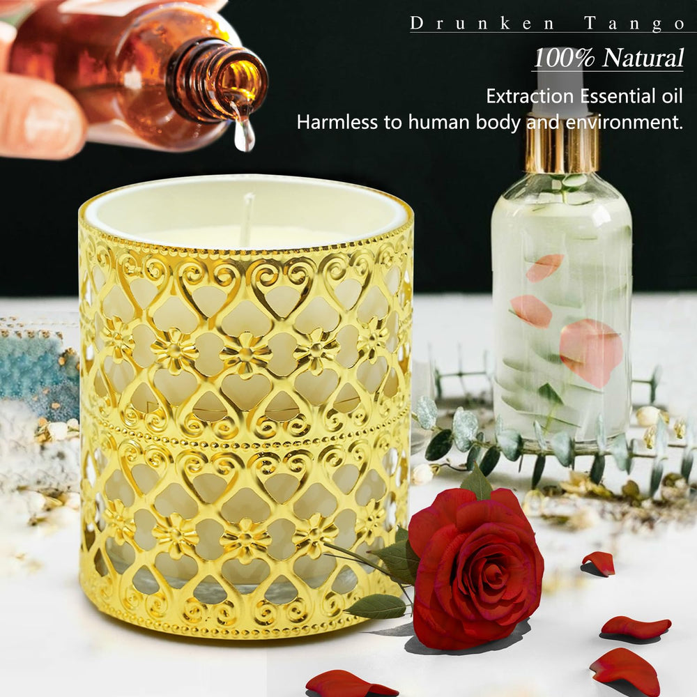 Close-up of gold candle holder and glass jar
