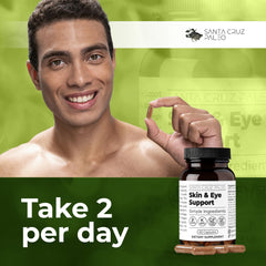 Skin & Eye Supplement capsules on wooden surface