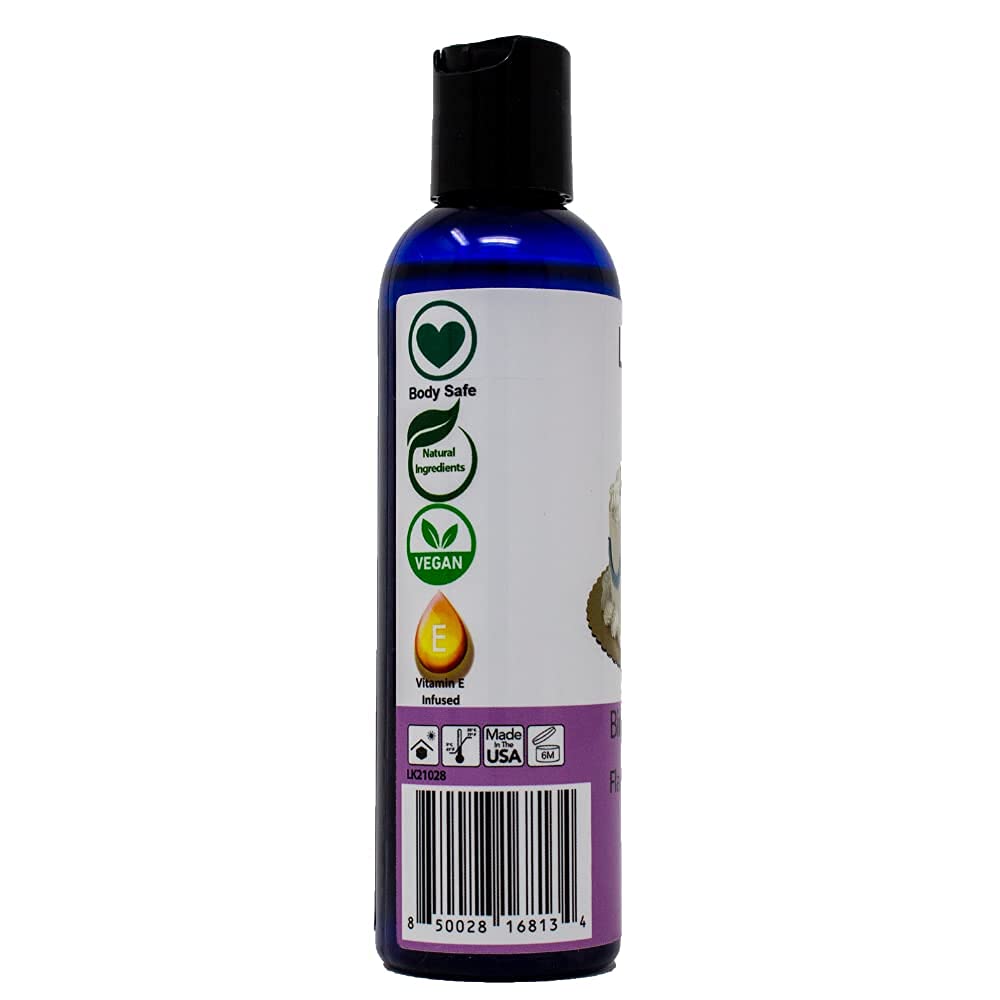 Applying moisturizing body oil to skin