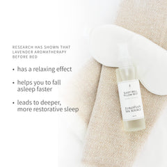 Lavender blooms and eucalyptus sprigs beside Sleep Well Pillow Mist