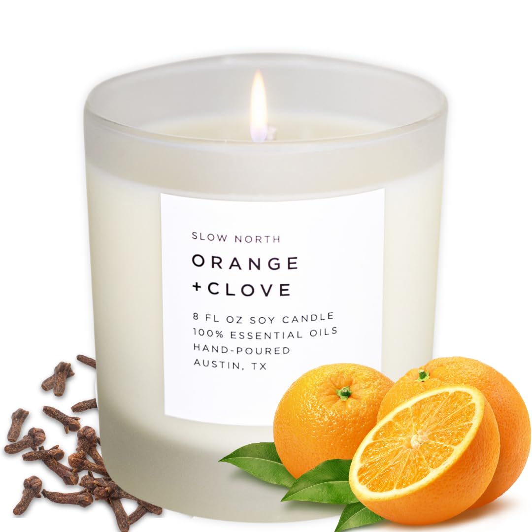 Slow North Orange + Clove Candle in a reusable frosted glass jar
