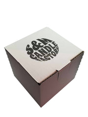 S&M Candle Factory 16oz square mason jar features clean-burning soy wax for longer-lasting ambiance.