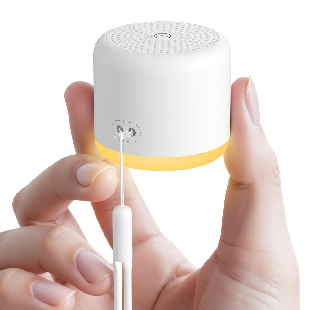 SMILEBOP travel-compact white noise machine for on-the-go soothing.