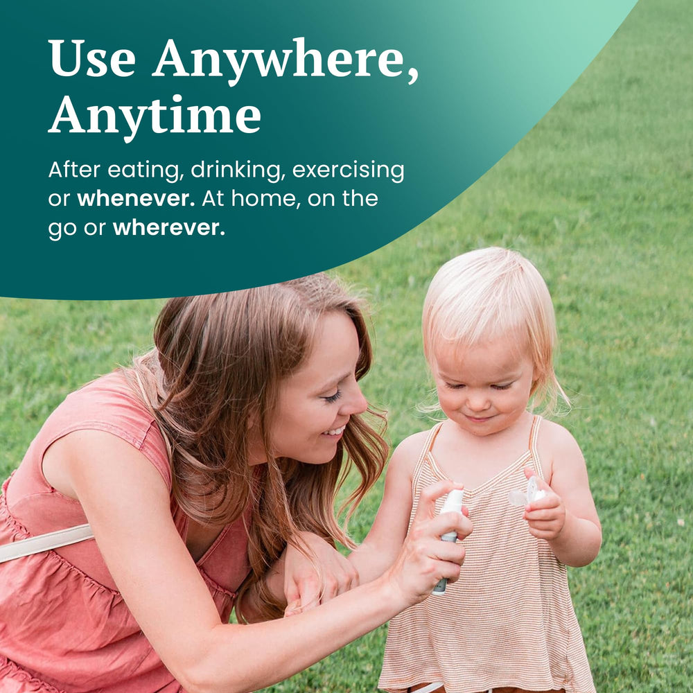 Aligners being cleaned with Smilesaver spray on the go