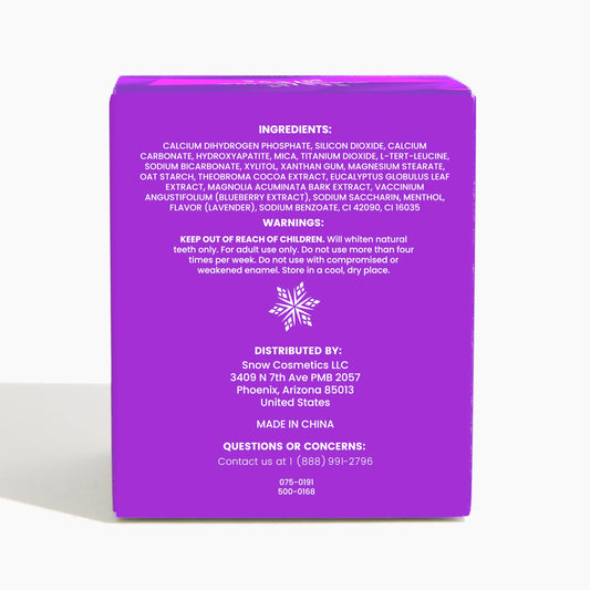 Purple color-correcting whitening powder sprinkled onto toothpaste