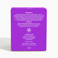Purple color-correcting whitening powder sprinkled onto toothpaste