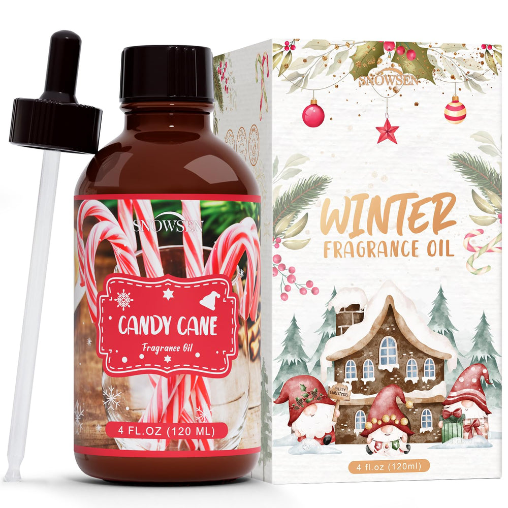Amber glass bottle of SNOWSEN Candy Cane Essential Oil with dropper