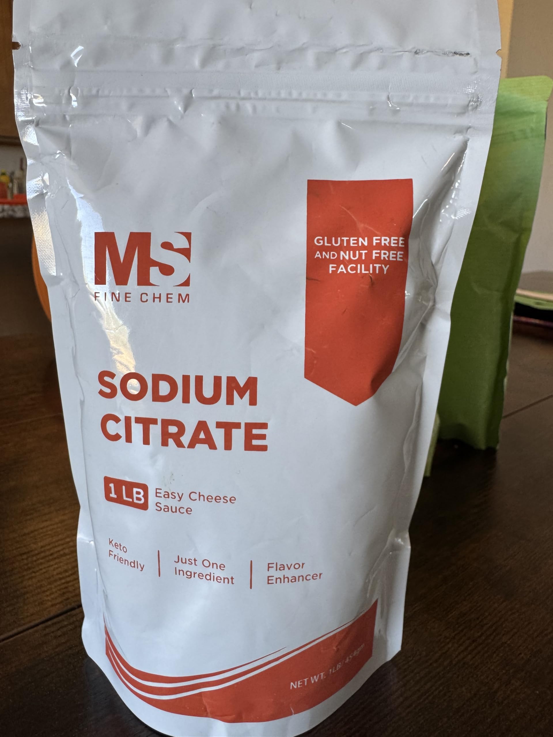 Front view of Sodium Citrate powder in 454g container