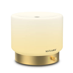 SOICARE glass diffuser with gold base closeup showing elegant design and subtle aroma potential
