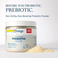 Close-up of Mycrobiome Prebiotic Powder texture (unflavored) in glass