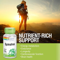Vegan organic spirulina capsules in bottle