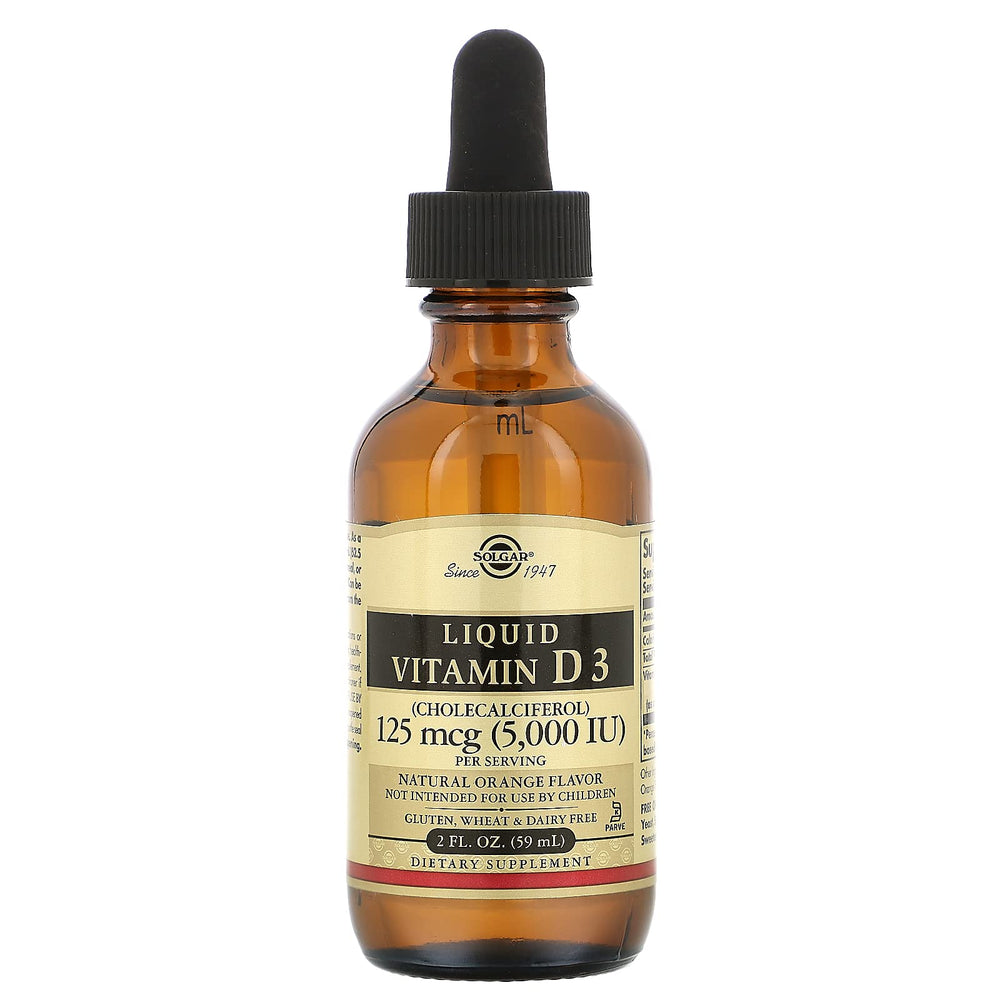 Close-up of orange Vitamin D3 liquid in the bottle