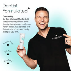 Toothpaste on toothbrush showing smooth mint paste