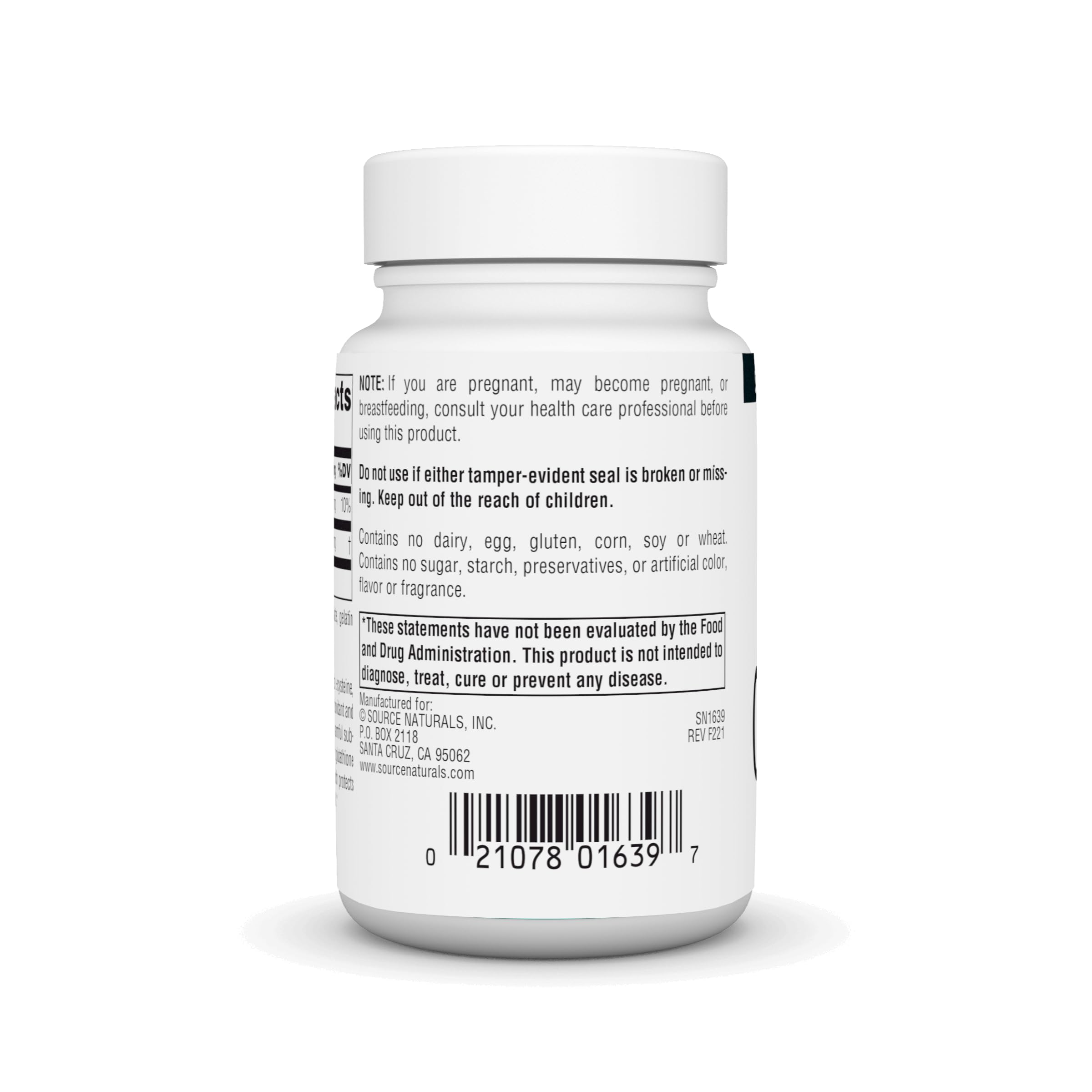 Glutathione supplement capsules beside bottle