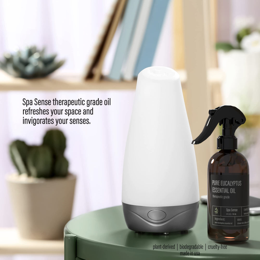 Spa Sense eucalyptus spray near diffuser and towels