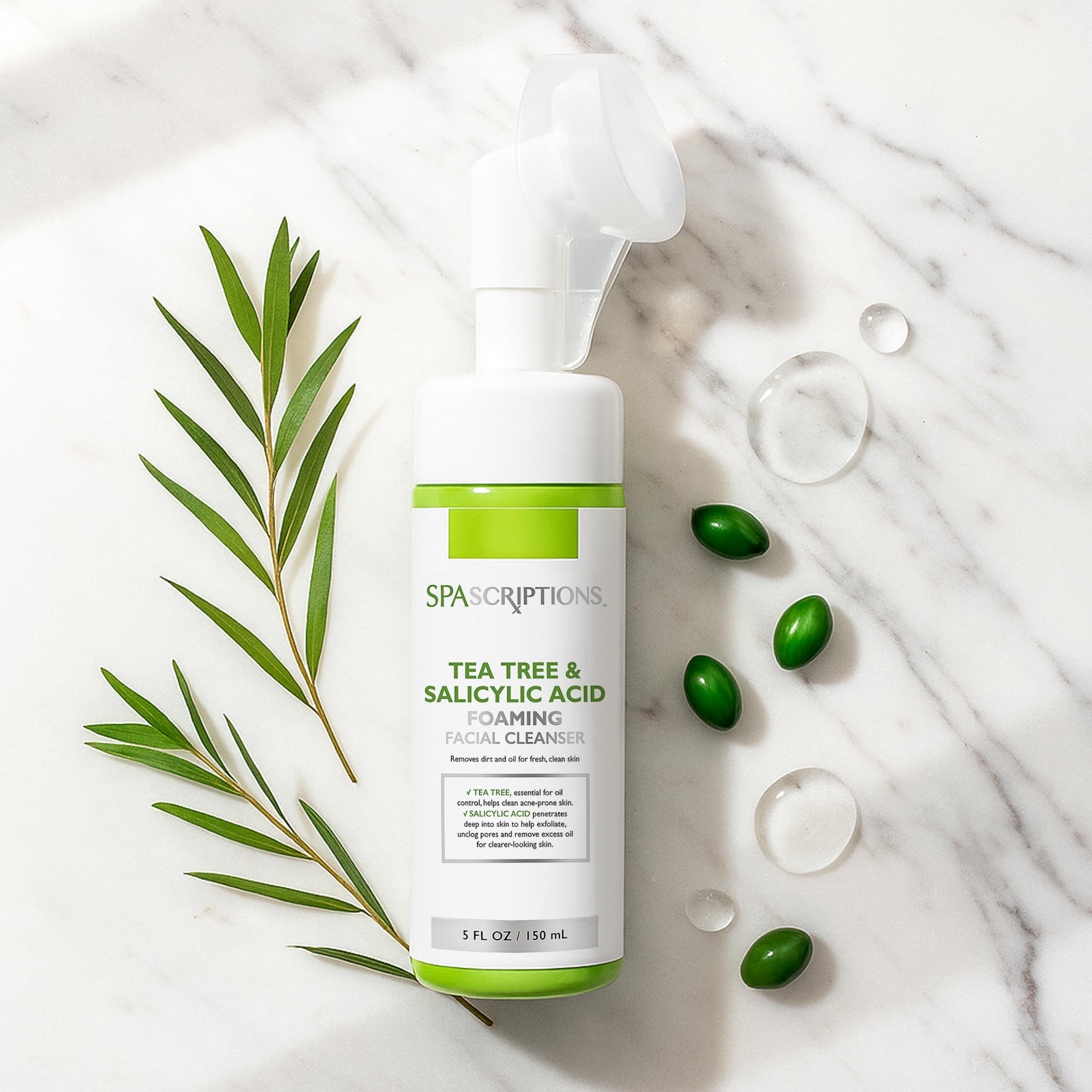 SpaScriptions product image with tea tree visual beside bottle highlighting oil-control benefits.
