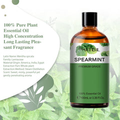 Close-up of 100ml amber spearmint essential oil bottle with dropper