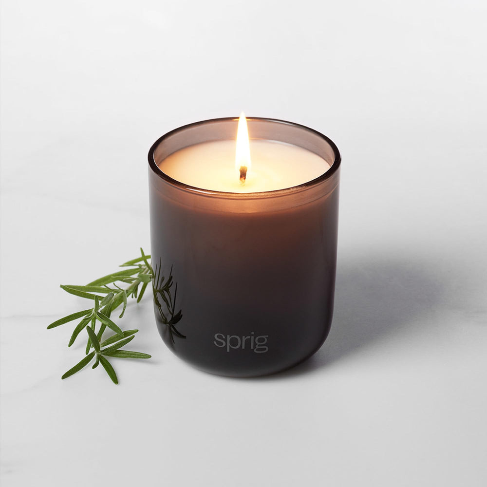 Recyclable packaging and candle jar of Sprig by Kohler Shield