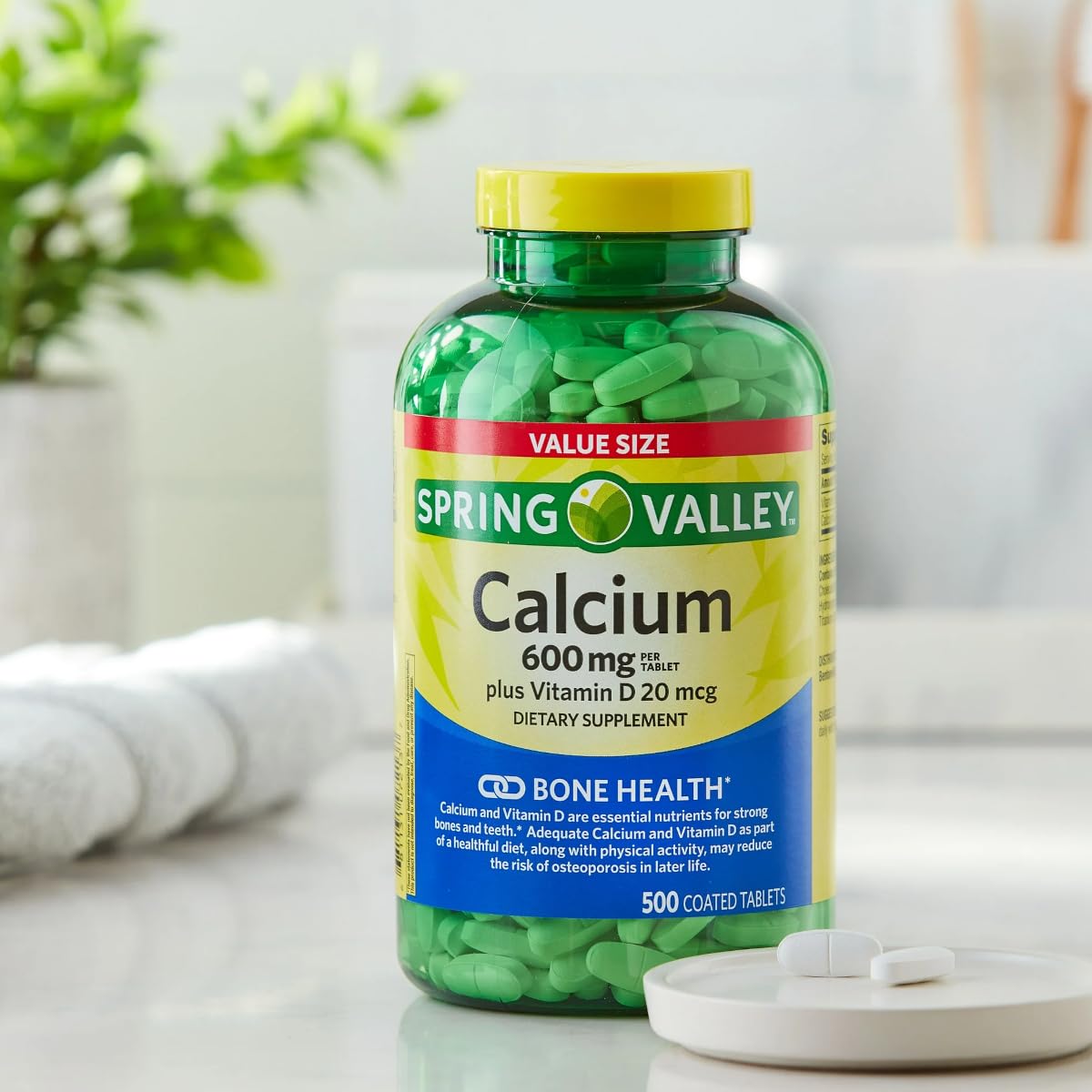 Coated calcium tablets for easy swallowing