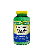Stack of white calcium citrate tablets