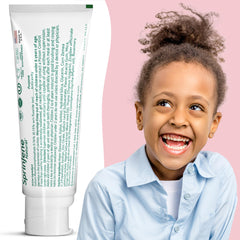 Close-up of two fluoride-free strawberry toothpaste tubes for children