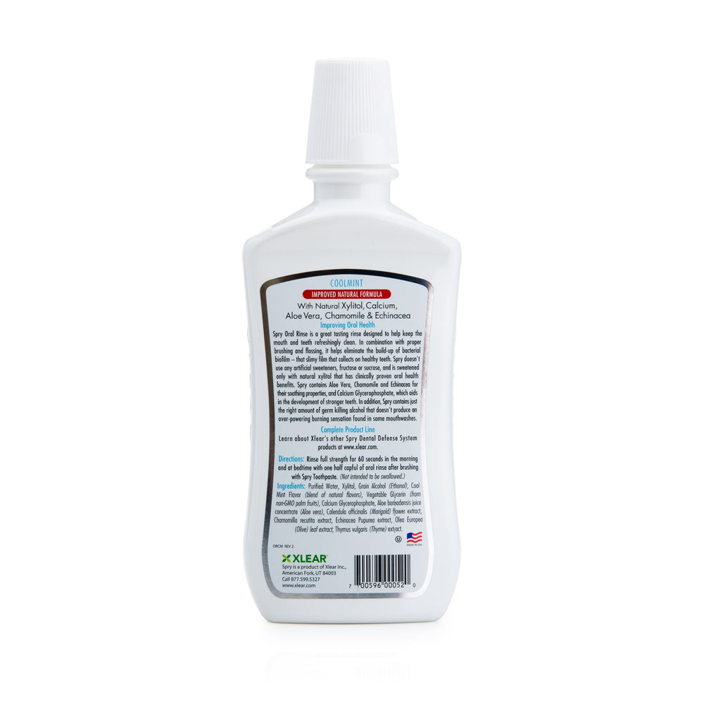 Close-up view of Spry Mouthwash bottle label and cap
