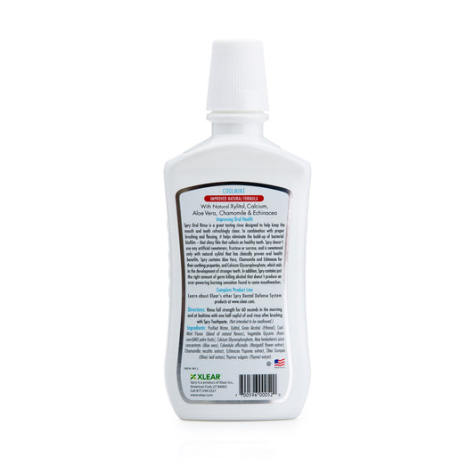 Close-up view of Spry Mouthwash bottle label and cap