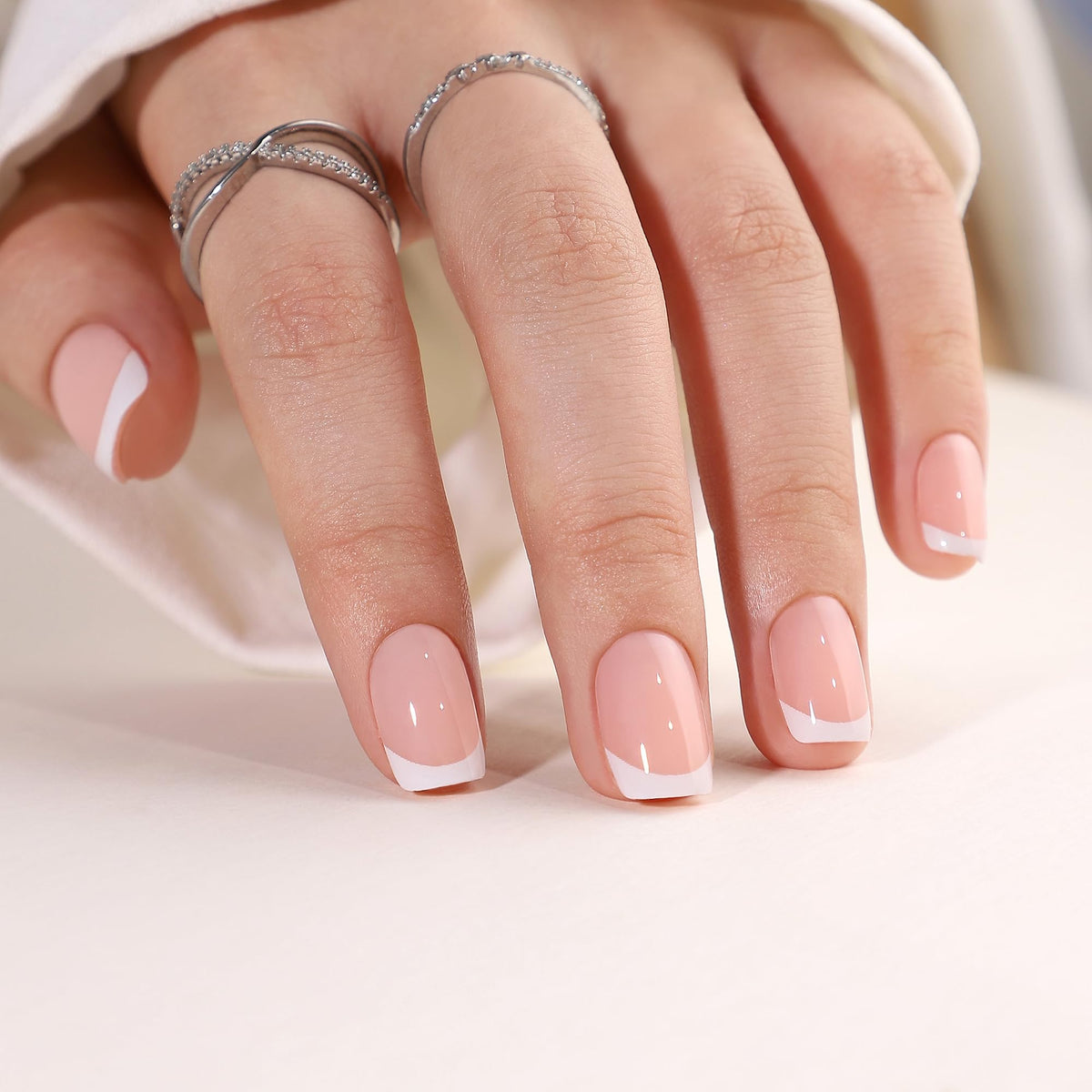 St. Friends press-on nails in almond French tip for easy home-glam.