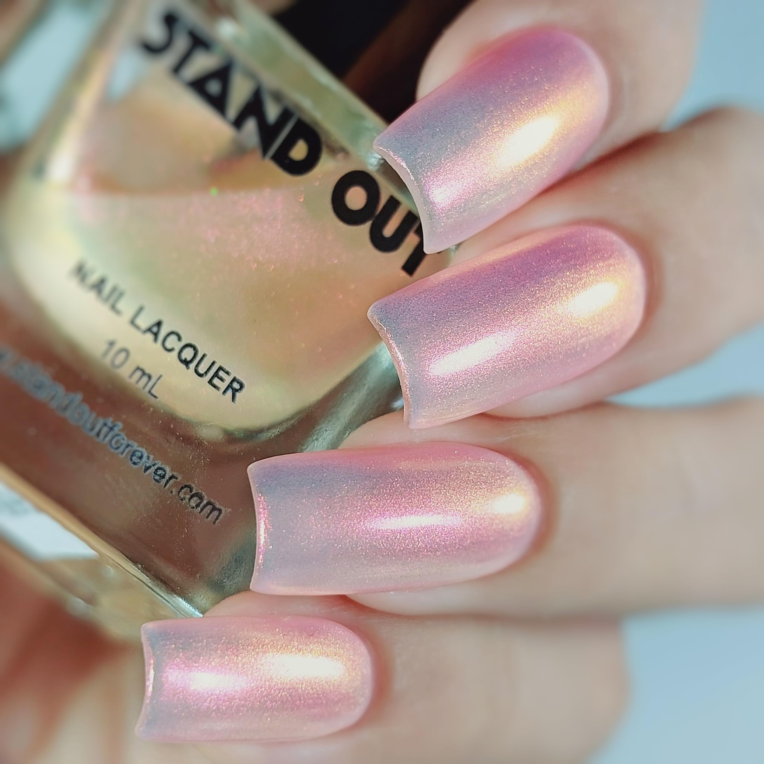 STAND OUT Ethereal Edge bottle close up showing color shifting shimmer for bold nails