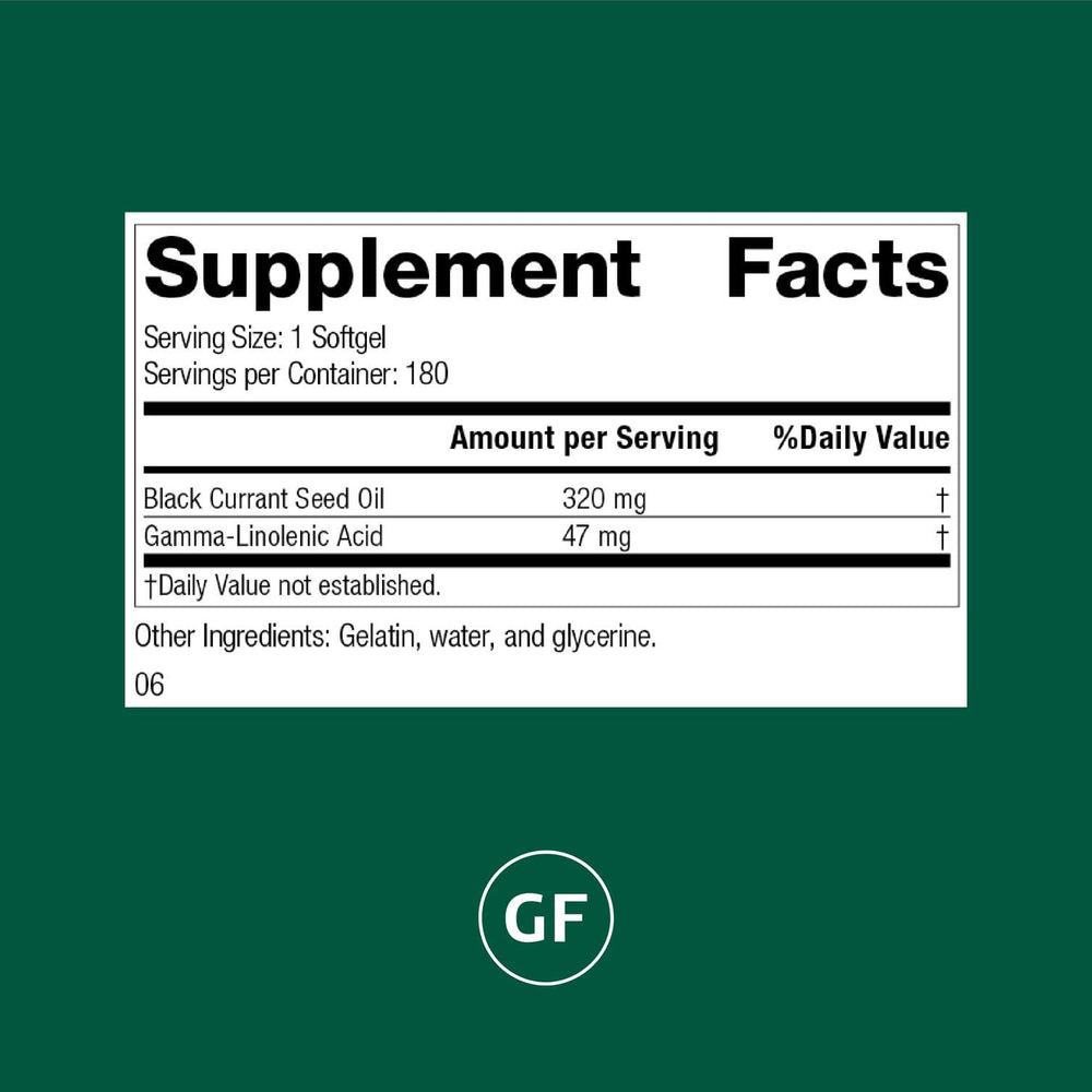 Close-up of Standard Process Black Currant Seed Oil bottle showing label for gluten-free use.