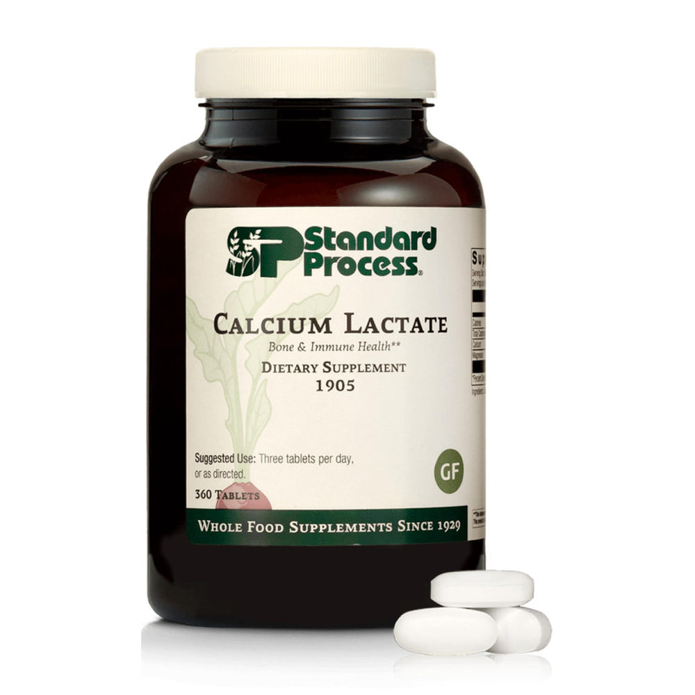 Bottle of Standard Process Calcium Lactate tablets for bone and immune health