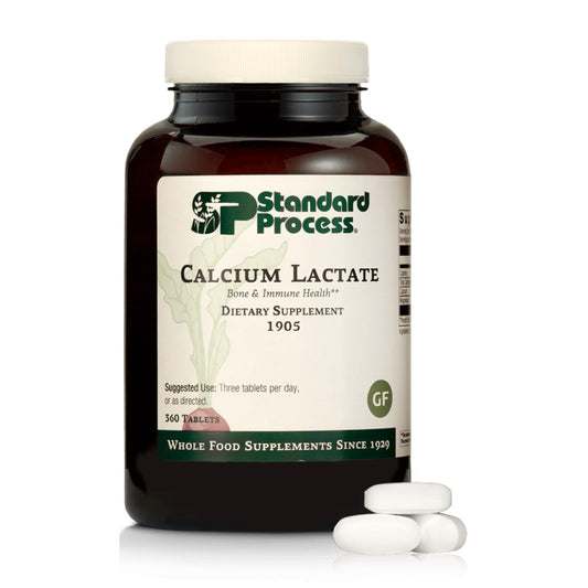 Bottle of Standard Process Calcium Lactate tablets for bone and immune health