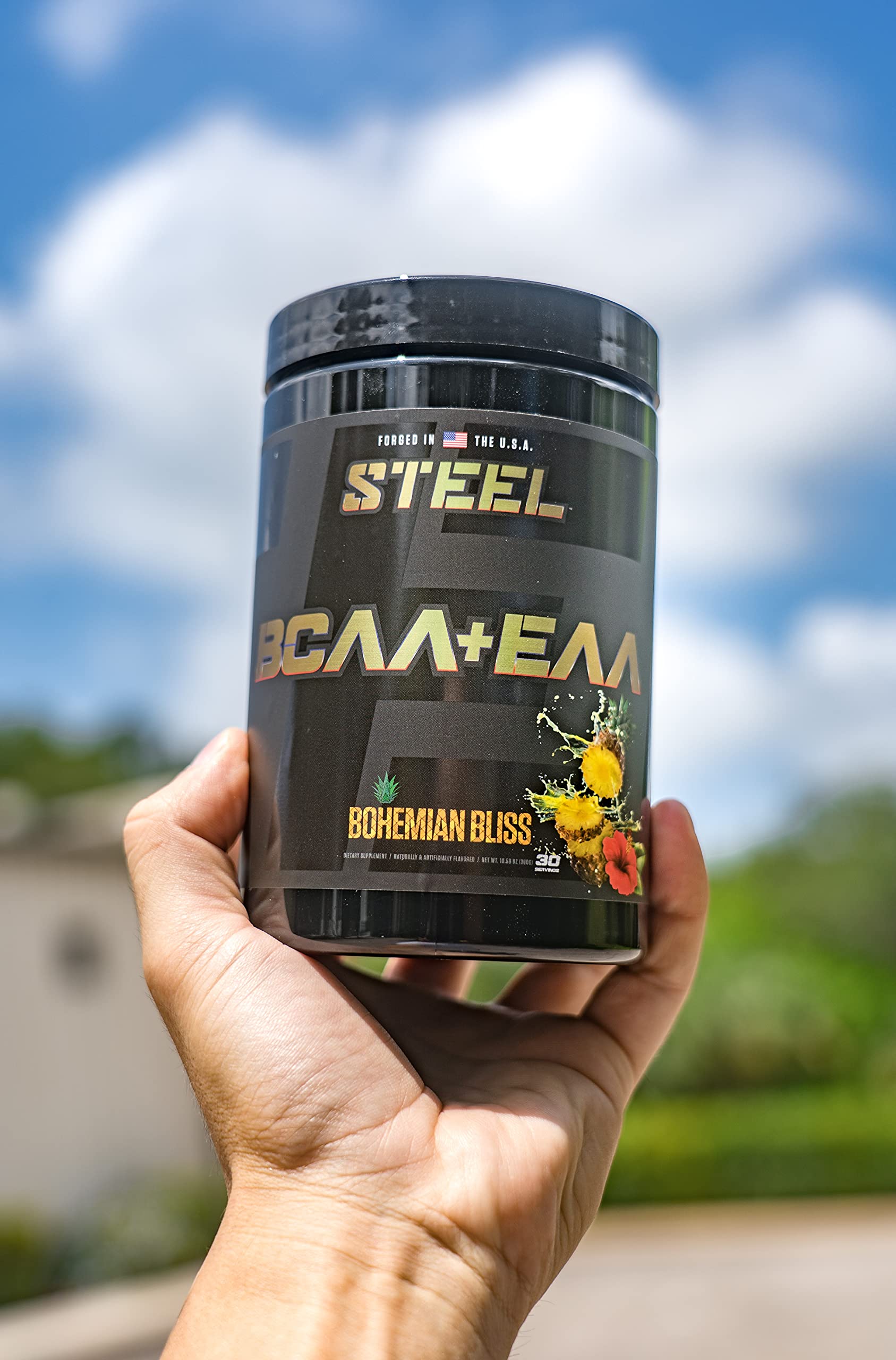 Athlete preparing to use BCAA EAA powder during workout