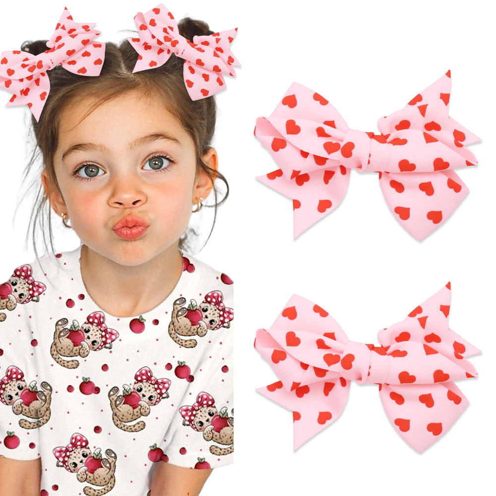 STGDAK Valentine heart bow clip with red print adds cute charm to hairstyles.