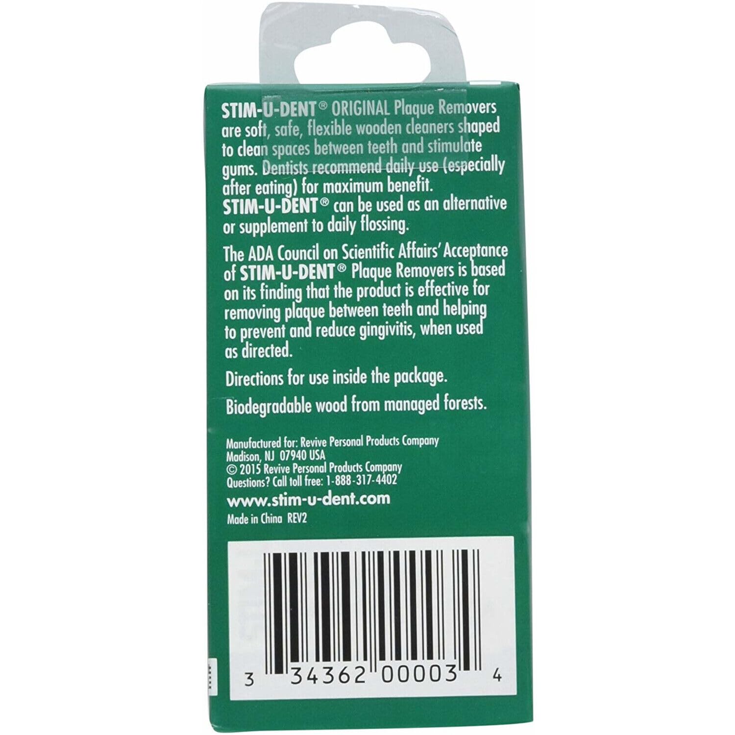 Close-up of Stim-U-Dent plaque remover picking away plaque