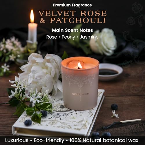 Natural strawberry quartz and clear quartz crystals embedded inside the candle.