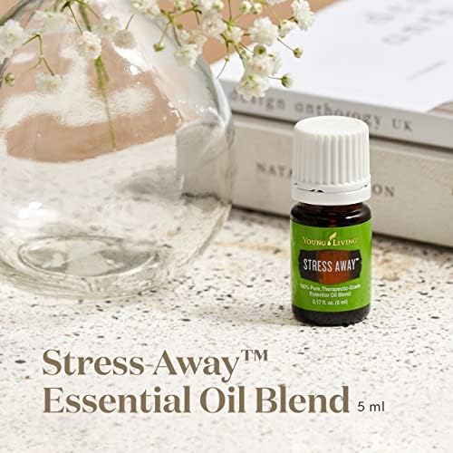 Diffuser emitting Stress Away aroma with bottle nearby