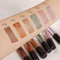 SUAKE glitter eye look ensemble showcasing versatile shimmer shades.