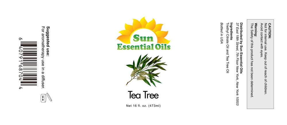 Amber glass bottle of tea tree essential oil with dropper
