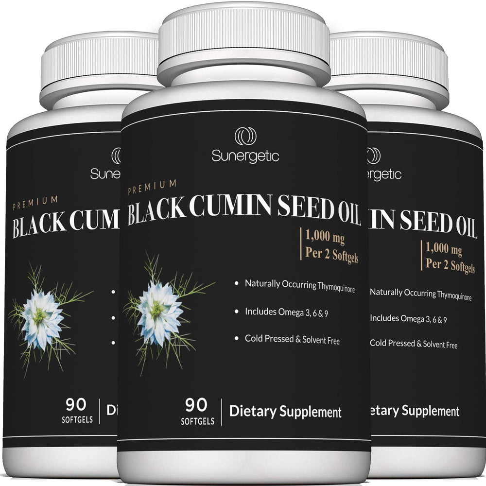 Lifestyle image with bottle and softgels on clean surface