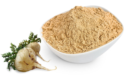 Scoop of Sunfood Maca Powder beside bag
